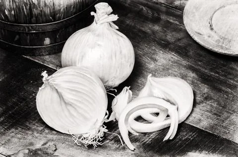 Fresh onions in rustic setting Photos