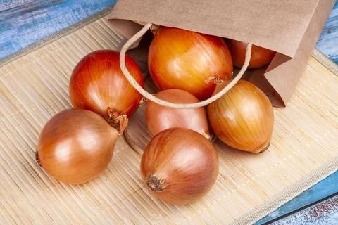Fresh onions on the table Stock Photos