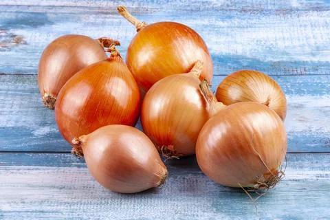 Fresh onions on the table Stock Photos
