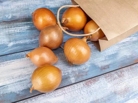Fresh onions on the table Stock Photos