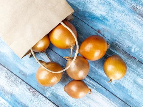 Fresh onions on the table Stock Photos