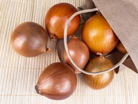 Fresh onions on the table Stock Photos