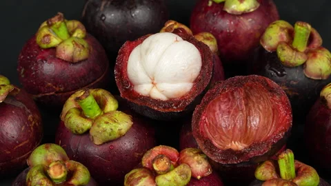 Fresh Opened Mangosteen Fruit Group Rotating In Studio 動画素材 336229637