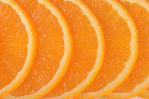 The fresh orange a background closeup Stock Photos