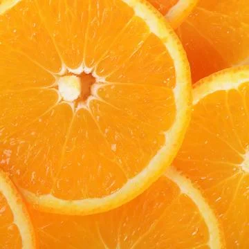 The fresh orange a background closeup Stock Photos