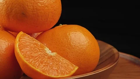 Fresh orange on black background. Vídeo Stock 344093176