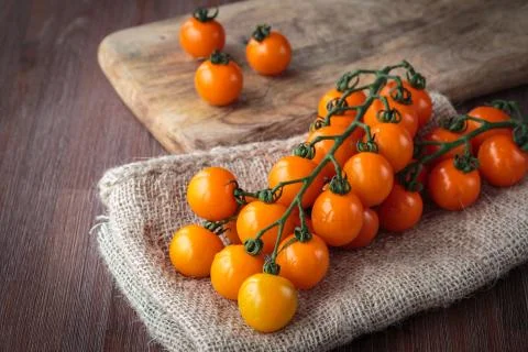 Fresh orange cherry tomatoes Stock Photos