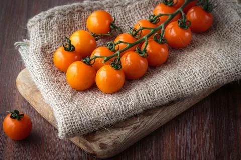 Fresh orange cherry tomatoes Stock Photos