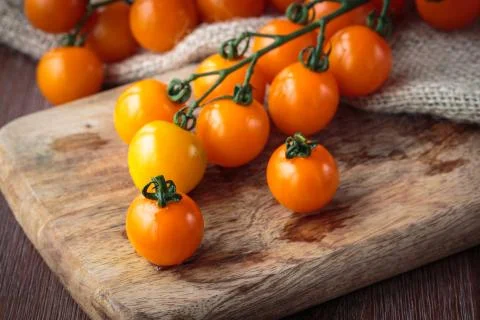 Fresh orange cherry tomatoes Stock Photos
