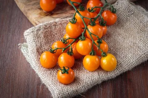 Fresh orange cherry tomatoes Stock Photos