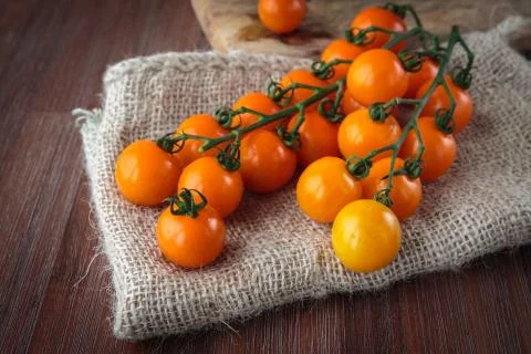Fresh orange cherry tomatoes Stock Photos