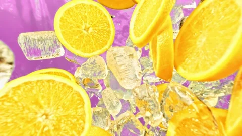 Fresh orange fruit ice cube and drops juicy or alcohol beverage or energy drink Stock Footage 226523628