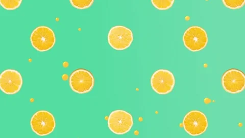 Fresh Orange Fruit with Liquid Droplets on a Teal Background Видео 334708266