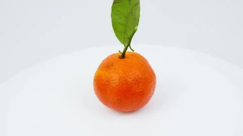 Fresh Orange Fruit Rotating on White Background Stock Footage 326978498