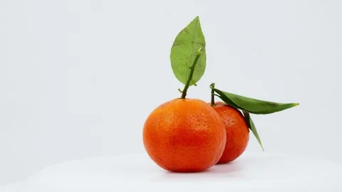 Fresh Orange Fruit Rotating on White Background Stock Footage 326979375