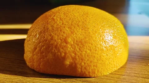 Fresh Orange Half with Dew Drops Top View Stock Footage 319441238