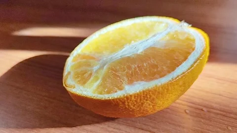 Fresh Orange Half Slice Macro in 4K Stock Footage 319441262