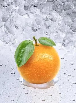 Fresh orange on ice cubes background Stock Photos