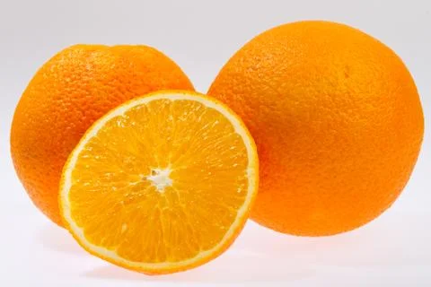 Fresh orange isolated on white Stock Photos