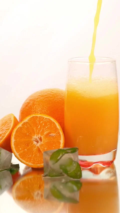 Fresh orange juice pouring Stock Footage 339905400