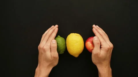 Fresh orange lemon grapefruit is Squeezed Into a Glass. Stop Motion Animation Stock Footage 87831969