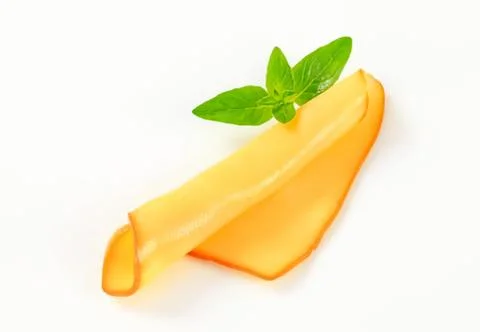 Fresh orange slice with mint leaf on top Stock Photos