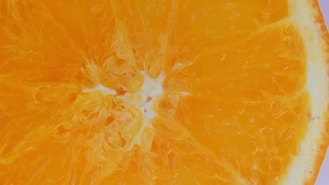Fresh Orange Slice Rotation Macro Food Background. Видео 334575211