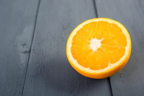 Fresh Orange Slice On Table Stock Photos
