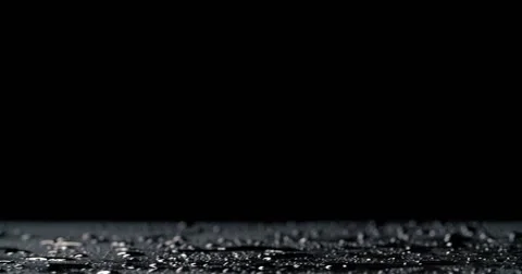 Fresh oranges falling onto black background Stock Footage 55879745