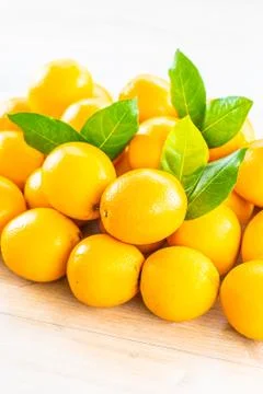 Fresh oranges fruit on table Stock Photos