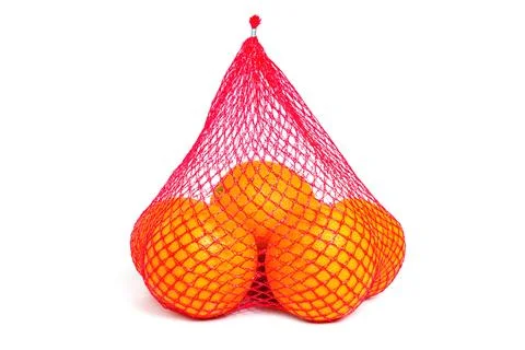 Fresh Oranges in a Red Mesh Bag Stockfoto's
