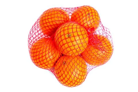 Fresh Oranges in a Retail Mesh Bag on White Stockfoto's