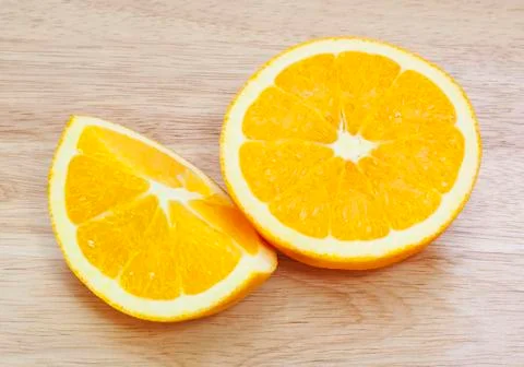 Fresh oranges on a table. Stock Photos