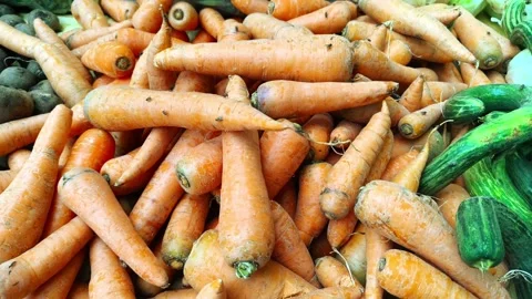 Fresh Organic Carrots Displayed at Vegetable Market with Healthy Farm Produc Stock Footage 338356016
