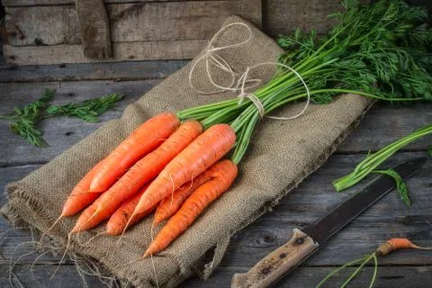 Fresh Organic Carrots  on rustic  table Stock Photos