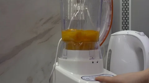 Fresh organic eggs falling into blender Stock Footage 103144866