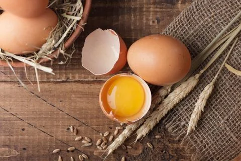 Fresh organic eggs on a table Stock Photos