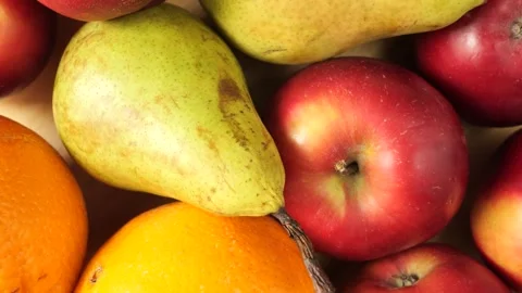Fresh organic fruit assortment of apples, pears and oranges Stock Footage 339366995