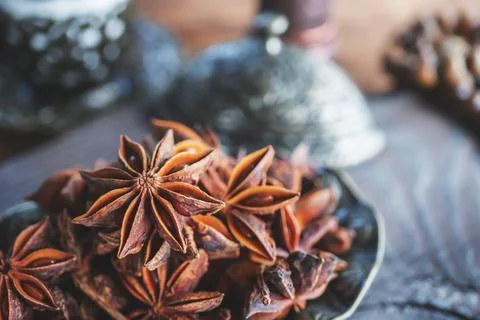 Fresh organic fruits and spice seeds from star anise . Still life in Arabic Stock Photos