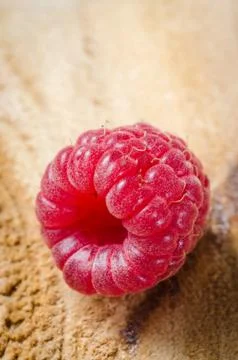 Fresh Organic Raspberry on Rustic Background. Stock Photos