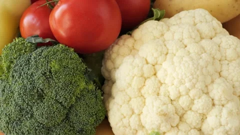 Fresh organic raw vegetables rotating slowly Stock Footage 337886185