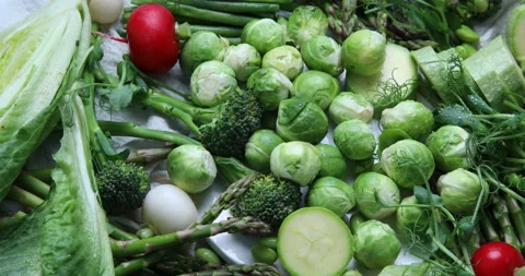 Fresh organic spring vegetables. Top view, rotation, 4k video  Stock Footage 171666360