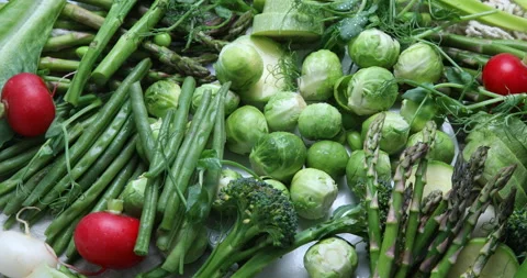 Fresh organic spring vegetables. Top view, rotation, 4k video  Stock Footage 171786831