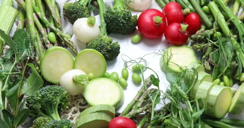 Fresh organic spring vegetables. Top view, rotation, 4k video  Stock Footage 171786870