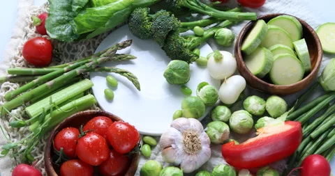 Fresh organic spring vegetables. Top view, rotation, 4k video  Stock Footage 171786898