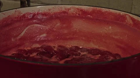 Fresh Organic Strawberry Jam Boiling in Pot on Kitchen Stove Stock Footage 337164635