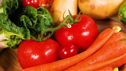 Fresh organic vegetable assortment including tomatoes carrots zucchini and .. 스톡 동영상 333468111