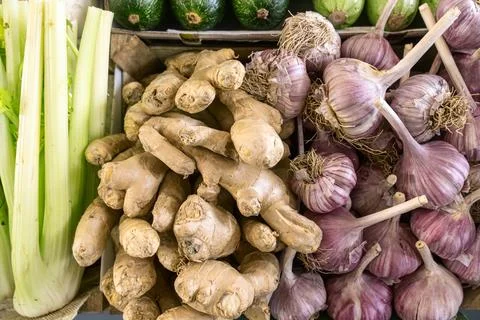 Fresh organic vegetables with celery ginger and garlic at farmers market. A.. Stock Photos