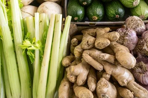 Fresh organic vegetables with celery ginger and garlic at farmers market. A.. Stock Photos