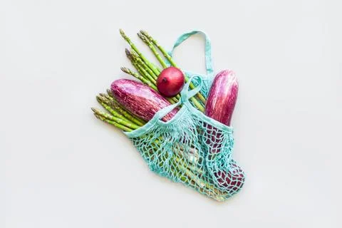 Fresh organic vegetables cotton mesh shopping bag Stock Photos